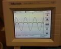 oscilloscope reading where current should be read of dmm