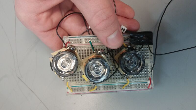 File:BlueLightsOnBreadboard.jpg