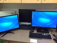 Mirrored ACER monitor on left